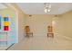 Large living room with tile flooring at 180 Palmetto Ne Cir, Port Charlotte, FL 33952