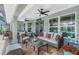 Relaxing patio area with comfortable seating and serene pool views at 185 Hercules Dr, Rotonda West, FL 33947