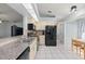 Bright kitchen featuring neutral cabinets, modern appliances, and ample counter space at 1865 Rival Ter, North Port, FL 34286
