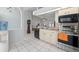 Well-lit kitchen with modern appliances, neutral cabinets, and open layout at 1865 Rival Ter, North Port, FL 34286