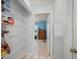 Well-organized pantry with wire shelving and ample storage space at 1865 Rival Ter, North Port, FL 34286
