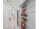 Walk-in pantry offering lots of storage with easy access from kitchen at 1865 Rival Ter, North Port, FL 34286