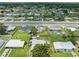 An aerial shot showcasing a neighborhood with well-maintained properties and green spaces at 22341 Midway Blvd, Port Charlotte, FL 33952