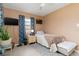 Cozy bedroom with a comfortable single bed, side table, and mounted TV at 22341 Midway Blvd, Port Charlotte, FL 33952