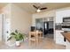 Cozy breakfast nook with a round table, two chairs, and sliding glass doors to the living room at 22341 Midway Blvd, Port Charlotte, FL 33952