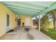 A covered carport provides shelter for vehicles and outdoor activities at 22341 Midway Blvd, Port Charlotte, FL 33952