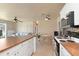 Open-concept kitchen flowing into the living spaces, with modern appliances at 22341 Midway Blvd, Port Charlotte, FL 33952