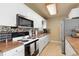 Functional kitchen featuring white cabinets, modern appliances, and ample counter space at 22341 Midway Blvd, Port Charlotte, FL 33952