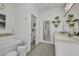 Modern bathroom features a freestanding tub, a walk-in shower, and a stylish vanity at 25062 Palisade Rd, Punta Gorda, FL 33983
