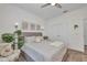 Bedroom featuring a neutral color scheme, double closets, and soft natural light at 25062 Palisade Rd, Punta Gorda, FL 33983