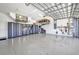 Spacious and organized garage with epoxy flooring, custom storage cabinets, and overhead racks at 25062 Palisade Rd, Punta Gorda, FL 33983