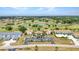 Aerial view of the condos overlooking the beautiful golf course and ponds at 26336 Nadir Rd # 10, Punta Gorda, FL 33983