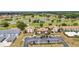 Aerial view of the condos overlooking the beautiful golf course and ponds at 26336 Nadir Rd # 10, Punta Gorda, FL 33983