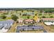 Aerial view of the condos overlooking the beautiful golf course and ponds at 26336 Nadir Rd # 10, Punta Gorda, FL 33983