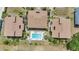 Bird's eye view of three condominiums surrounding community pool at 26336 Nadir Rd # 10, Punta Gorda, FL 33983