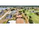 See a full aerial view of the buildings and landscaping at 26336 Nadir Rd # 10, Punta Gorda, FL 33983