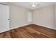 Light and airy bedroom with modern hard wood floors and large window at 26336 Nadir Rd # 10, Punta Gorda, FL 33983