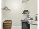 Walk in closet features wire shelving, tile flooring, and dark-wood storage unit at 26336 Nadir Rd # 10, Punta Gorda, FL 33983