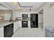 Well-lit kitchen with modern appliances and ample counter space, ideal for cooking and food preparation at 26336 Nadir Rd # 10, Punta Gorda, FL 33983