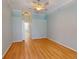 Spacious bedroom with hardwood floors, ceiling fan, and neutral paint, ready for personalization at 421 Marsh Creek Rd, Venice, FL 34292