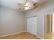 This bedroom features light-colored wood floors and a double-door closet at 421 Marsh Creek Rd, Venice, FL 34292