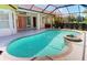 Stunning screened-in pool and patio area, perfect for soaking up the sun and relaxing with friends and Gathering at 421 Marsh Creek Rd, Venice, FL 34292