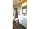 Stylish bathroom featuring updated vanity and fixtures, with a shower-tub combo at 426 Ricold Ter, Port Charlotte, FL 33954
