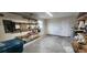 Spacious garage with ample storage, shelving, and access door at 426 Ricold Ter, Port Charlotte, FL 33954