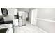 Modern kitchen with stainless steel appliances and granite countertops at 426 Ricold Ter, Port Charlotte, FL 33954