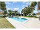 Spacious backyard with a sparkling pool, and ample space for outdoor activities at 4460 Northshore Dr, Punta Gorda, FL 33980