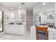 Bathroom featuring double sinks, vanity area, and black-and-white patterned floor at 4460 Northshore Dr, Punta Gorda, FL 33980