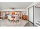Open-concept dining room showcasing seamless flow to living spaces, enhancing both style and functionality at 4460 Northshore Dr, Punta Gorda, FL 33980