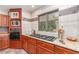 Gourmet kitchen featuring modern appliances, tiled backsplash, and ample countertop space for culinary enthusiasts at 4460 Northshore Dr, Punta Gorda, FL 33980