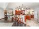 Open kitchen with breakfast bar overlooking dining and living spaces, great for entertaining at 4460 Northshore Dr, Punta Gorda, FL 33980