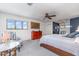 Relaxing main bedroom boasts a king bed, cozy chair, and calming color scheme to create a comfortable retreat at 4460 Northshore Dr, Punta Gorda, FL 33980