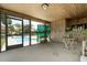 An enclosed room offers storage and convenient access to a refreshing pool area at 4460 Northshore Dr, Punta Gorda, FL 33980