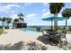 Relax by the poolside with a private pool, a waterfall feature, and comfortable seating at 4460 Northshore Dr, Punta Gorda, FL 33980