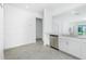 Open-concept design kitchen featuring stainless steel appliances and ample counter space at 8706 Seasalt Loop, Englewood, FL 34224