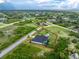 A beautiful Cape Coral home with a screened pool and fully fenced in yard, all in a picturesque neighborhood at 9954 Audrey St, Port Charlotte, FL 33981