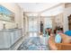 Elegant living room with tray ceilings, luxury decor, and wood floors at 9954 Audrey St, Port Charlotte, FL 33981