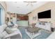 Spacious open-concept living area connects seamlessly with the kitchen and outdoor spaces at 9954 Audrey St, Port Charlotte, FL 33981