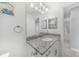 Bright bathroom featuring granite countertops and modern fixtures at 12112 Helios Ave, Port Charlotte, FL 33981