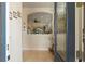 Foyer showcasing an open floor plan, tile flooring, and decorative accents at 13935 Campoleone St, Venice, FL 34293
