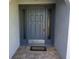 Inviting front door with sidelights and stylish hardware welcomes you to this home at 15037 Mcgraw Ave, Port Charlotte, FL 33953