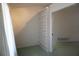Small office space with window for natural light and built in shelving at 15037 Mcgraw Ave, Port Charlotte, FL 33953