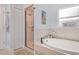 Relaxing bathroom with separate shower and soaking tub, with modern fixtures at 1546 Gourmet Rd, North Port, FL 34288