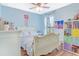 Bright bedroom featuring a decorative bed and lots of room for storage at 1546 Gourmet Rd, North Port, FL 34288