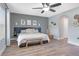 Stylish bedroom features modern furnishings, light wood floors, and elegant decor at 1546 Gourmet Rd, North Port, FL 34288