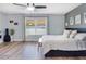 Calm main bedroom with natural light, soft décor, and a comfortable king-size bed at 1546 Gourmet Rd, North Port, FL 34288