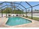 Beautiful screened pool featuring a spacious deck perfect for entertaining and relaxation at 1546 Gourmet Rd, North Port, FL 34288